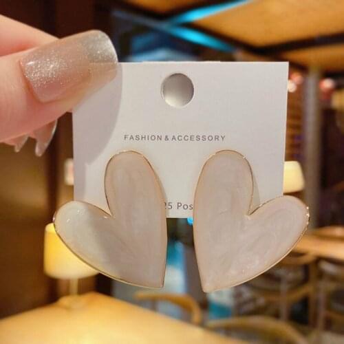 Korean version of jewelry retro white peach heart-shaped exaggerated love drip glaze ins earrings female jewelry wholesale