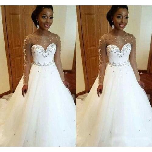 South Africa 2021 Sheer Jewel Neck Illusion Long Sleeve Wedding Dresses Crystal Beaded Bridal Gown Plus Size Custom Made