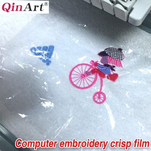 Computer embroidery special crisp film to make plush toys towel sweater fabric with transparent embossing film double plastic