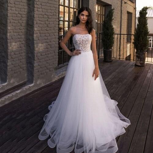White Wedding Gowns Strapless Button Back Sweep Train Tulle Beading Pearls A-line Wedding Dress robe mariage