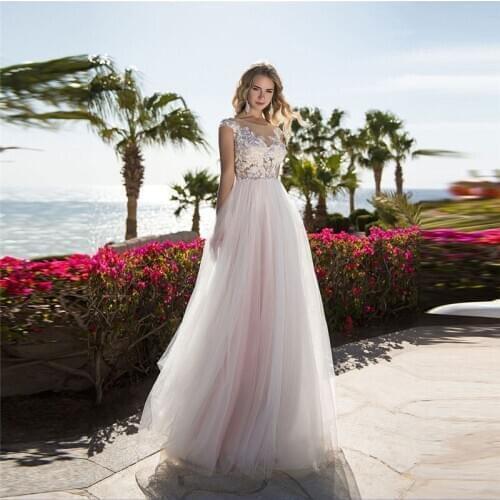 2021 Scoop Neck A Line Wedding Dresses Lace Appliques Sexy Open Back With Button Train Tulle Garden New Bride Dress Custom Made