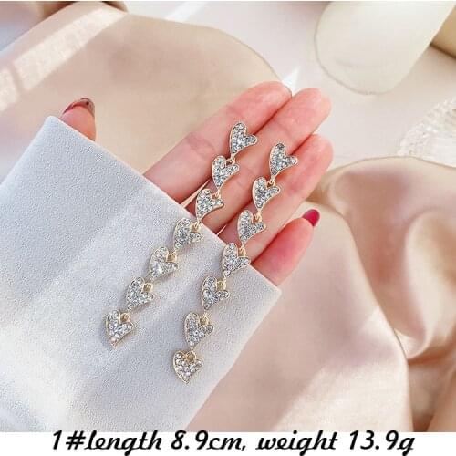 Temperament net red same earrings Korean temperament tassel long high-end earrings female simple super fairy explosion earrings