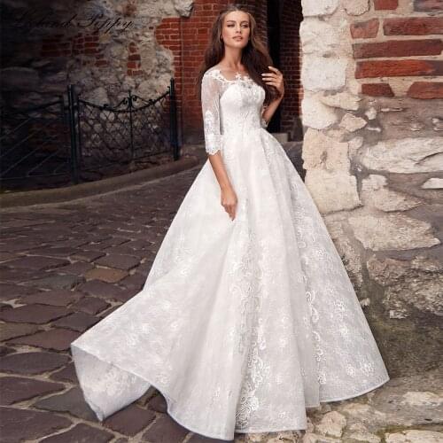 LCELAND POPPY Lace Wedding Dresses