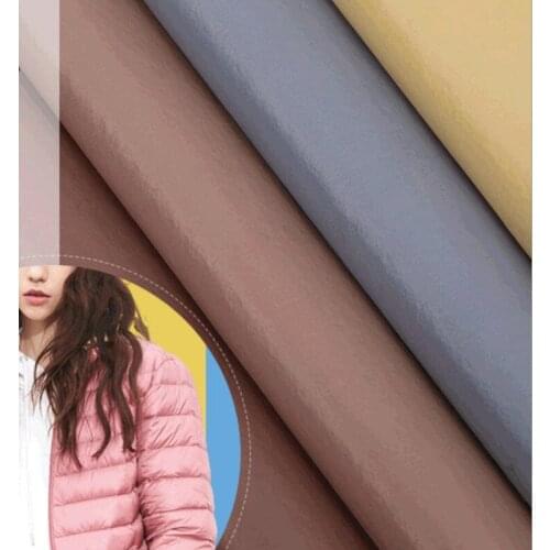 Wholesale by roll quality 20d nylon taffeta bright fabric down jacket cotton jacket nylon fabric waterproof Windbreaker fabric