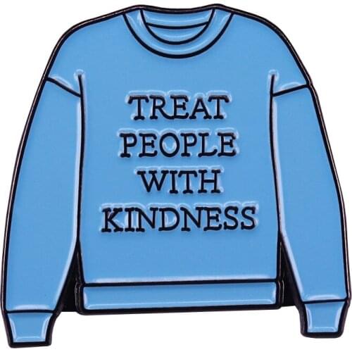This baby blue sweater enamel pin reminds us treat each other with kindness