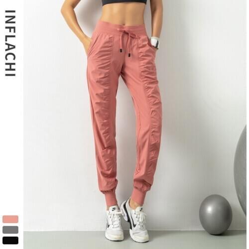 Autumn New Breathable Ladies Sports Pants Were Thin and Loose Running Fitness Pants Nine Points Pockets Feet