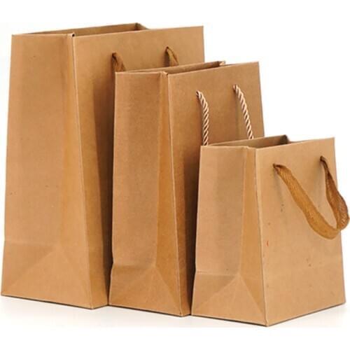 Xin Jia Yi Packaging Newest Design Kraft Paper Bags Paper Shopping Bag