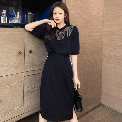 European and American Tassel Splicing Lace Crochet Top + Buttocks Show Thin Skirt Suit Womens New 2020 Spring