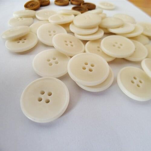 Free shipping 10pcs/lot Ultrafine natural ivory fruit loops four eyes edge meters high-grade white suit buttons knit buttons