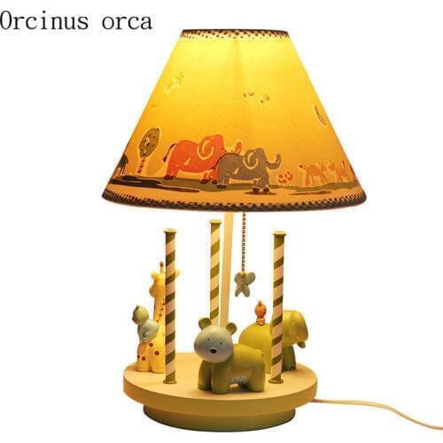 Cartoon creative merry go round table lamp boy girl bedroom childrens room lamp modern simple animal decorative table lamp