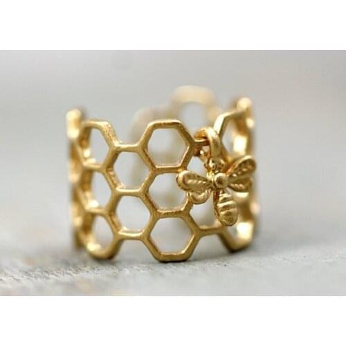 New products sell like hot cakes of cellular ring and little bee, adjustable hexagon beehive jewelry, lovely honeycomb ring