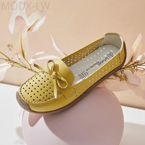 Womens loafers new hollow breathable comfortable leather nurse shoes flat large size moccasin casual outdoor non-slip shoes