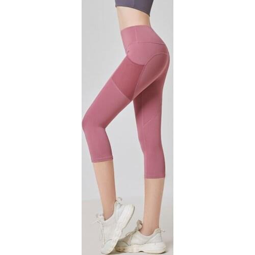 Yoga Pants Women Side Pockets Cropped 2021 High-end Fashion Sexy High Waist Gym Peach Hips Fitness sports tights