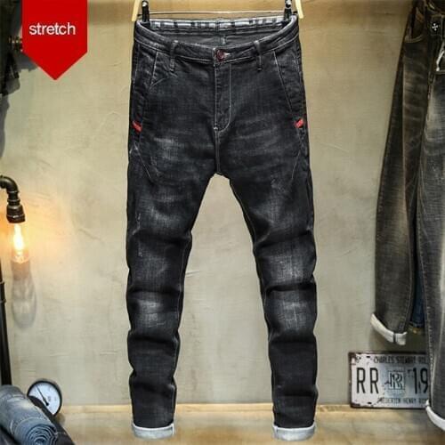Spring autumn 2020 black Denim jeans mens scratching brand Korean personality casual pants Slim feet shaking pencil pants