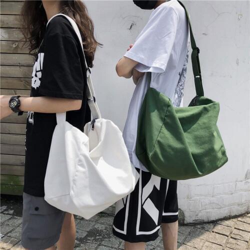 Travel bag female large-capacity bag Korean wild couple leisure travel shoulder suitcases and travel bags