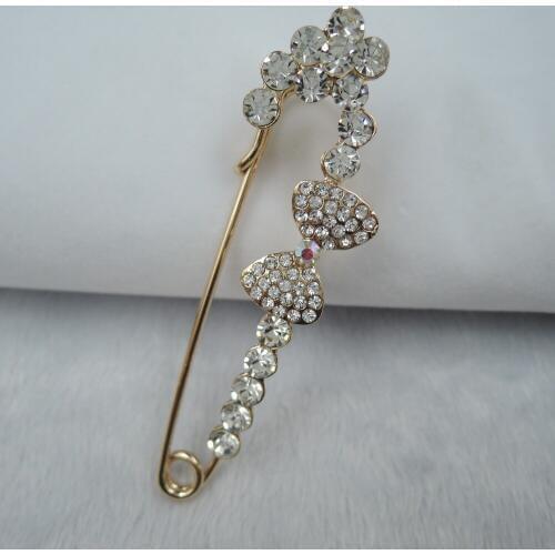 Women brooches top new fashion brooch made of metal and crystals