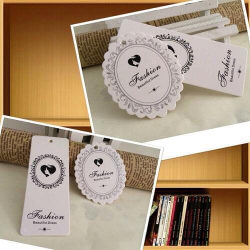 Custom clothing hang tag 300gsm paper board garment swing hang tag customized clothes label tags and design