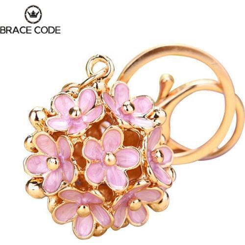Spring Fine bag car keychain women Three-dimensional Hollow Five-leaf Clover/daisy Flower Car key Pendant Small Gift Rhinestone