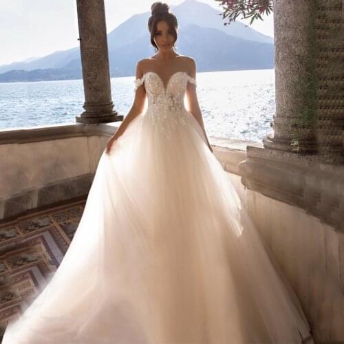 Sweetheart Off Shoulder Sheer Neck Tulle Buttons Appliques Lace A-Line Wedding Dress 2021 Vestido De Noiva Bridal Gown