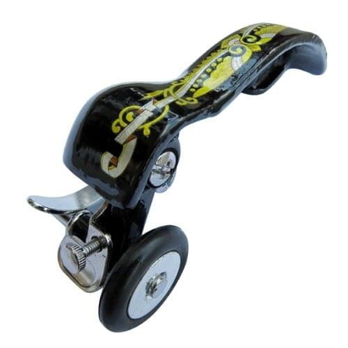 Old-fashioned sewing machine parts. Butterfly brand sewing machine trapeze cards and other household foot winding device