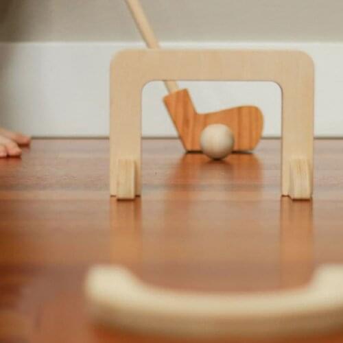 WOOD CHILD GOLF SET ( 2 STICKS, 2 BALLS, 1 CASTLE AND ONE PIT) IS HARMLESS TO HEALTH, YOU CAN USE IT SAFELY