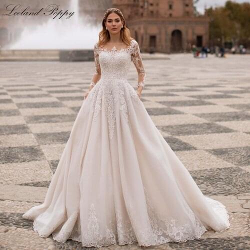 Lceland Poppy A-line Lace Appliques Wedding Dress 2021 Long Sleeves Pearls Beaded Scoop Neck Vestido de Novia Bridal Gowns