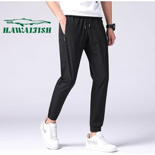 Spring and summer new outdoor sports pants mens casual trousers Korean version of slim leggings pants youth quick-drying pants