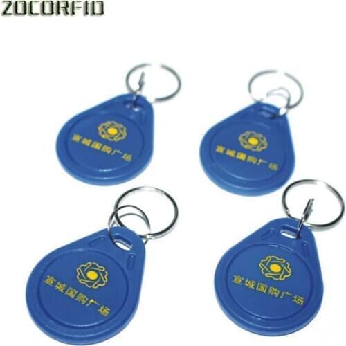 Free shipping 100pcs/Lot include printing logo 13.56MHZ RFID Tag Proximity Smart ICToken Tag Key Ring /access control card