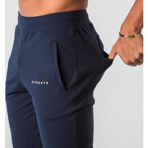 2021 New Muscle Fitness Running Training Sports Cotton Trousers Mens Breathable Slim Beam Mouth Casual Health Pants