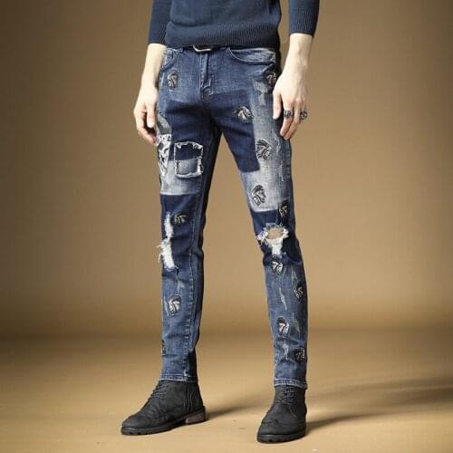Free Shipping New male Embroidered mens tribe chief embroidery ripped jeans Holes distressed blue stretch denim pants trousers