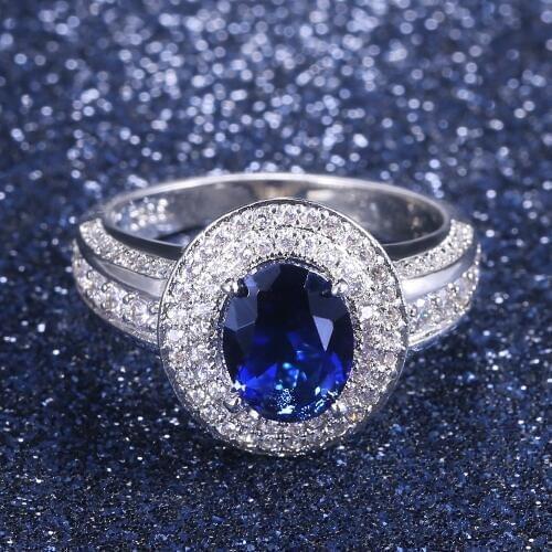 Huitan Luxury Prong Setting-Rings For Women With Deep Blue Zircon Stone Anniversary Gift Rings For Wife Micro Paved Middle Rings