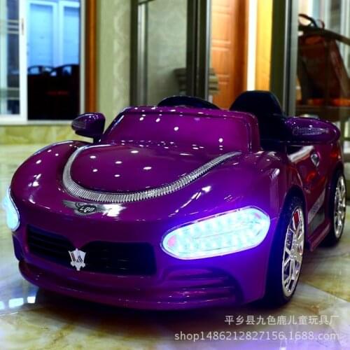 Free Shipping New Masera kids can drive ride on children electric remote control toy car four stroller baby with blue headlight