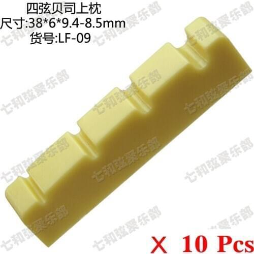 10 Pcs Yellow Plastic 4 String Electric Bass Guitar Nuts sIze=38 x 6 x 9.4-8.5mm (LF-09-YE-10)