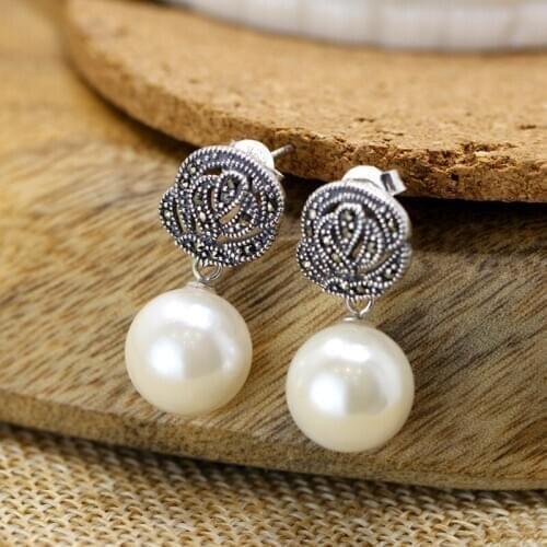 KJJEAXCMY fine jewelry S925 Sterling silver inlay pearl female style ear-nailing earrings accessories jewelry