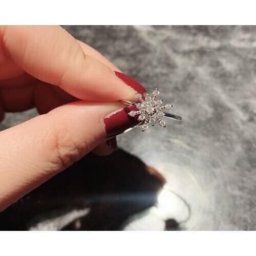 TheGreenParty net red rotating ring turning forefinger ring vibrato Christmas explosion simple snowflake silver 925 jewelry