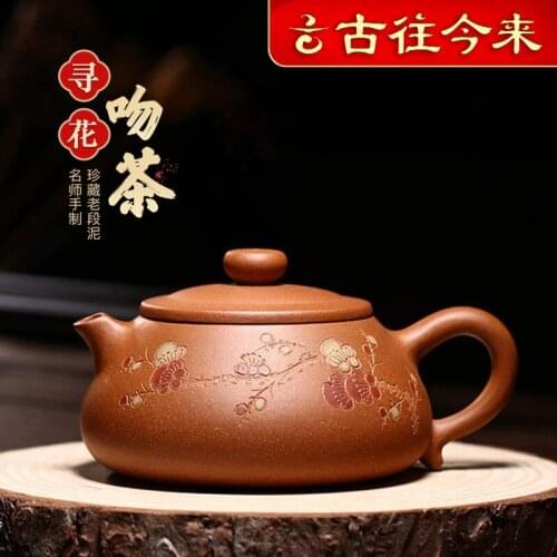 Clay teapot is purely hand-made gift giving, and the household tea making teapot duanni seeks flowers and kisses tea