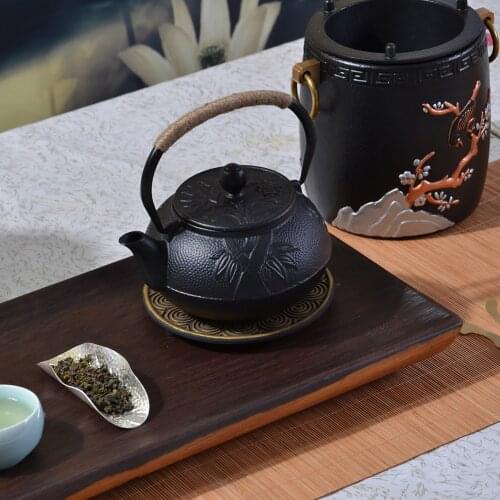 600ml Ancient Chinese Style Teapot Plum Blossoms Orchid Bamboo Carving Iron Teapot Durable Brewing Teapot Creative Gift