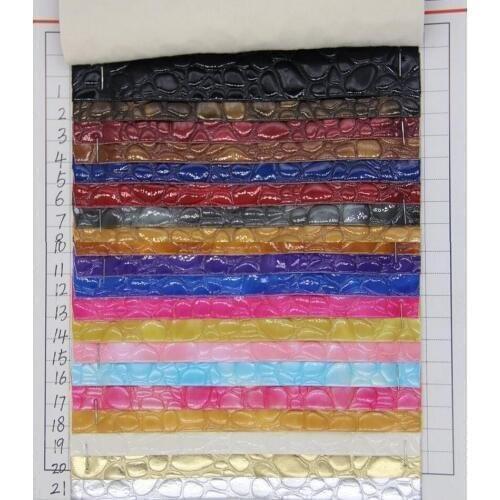 Wholesale artificial PVC stone texture leather fabric thick 1.1mm high light crystal stone grain leather decoration fabric