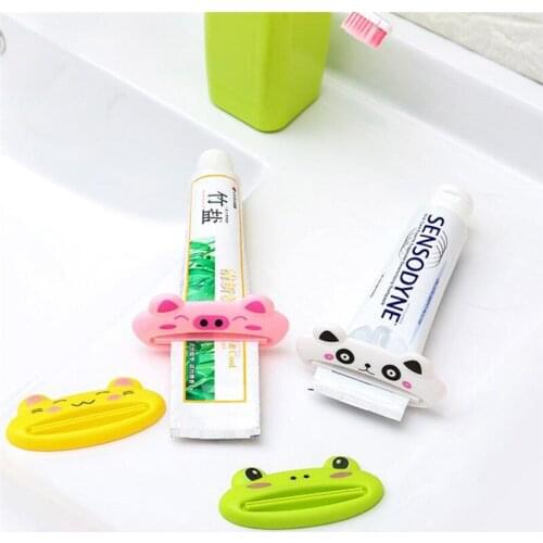 1/2/4Pcs Home bathroom cartoon multi-purpose creative toothpaste squeezer rolling holder plastic environmentally friendly 5z