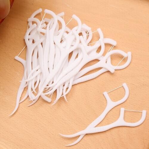 A bag of 50 Boxed dental floss sticks ultra-fine slippery dental floss family set bow tick cleaning interdental dental floss