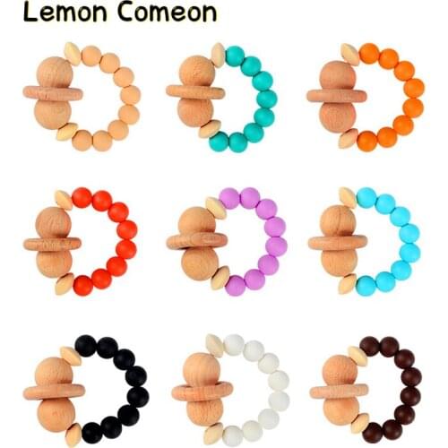 1PC Baby Teether Beech Wooden Ring BPA Free Silicone Beads Hand Teething Rattle Silicone Teether Food Grade Baby Product