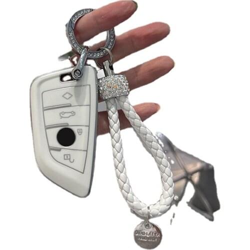 Suitable for BMW key cover 3 series 5 series 320 buckle 1 series shell new 7 series x1x5x3x6 pack 525li/530 blade female cute