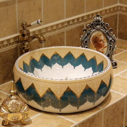 China Artistic Handmade Ceramic wash basin Counter top wash sink art round ceramic wash basin bathroom sink