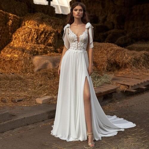 UZN BOHO Wedding Dress A-Line V-Neck Lace Appliques Chiffon Bridal Dress Sexy High Split Brides Dress With Bowknot