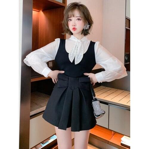 Studded bow shirt stitching vest vest vest fake two piece top womens wear 2021 Spring new High Quality Top Quality