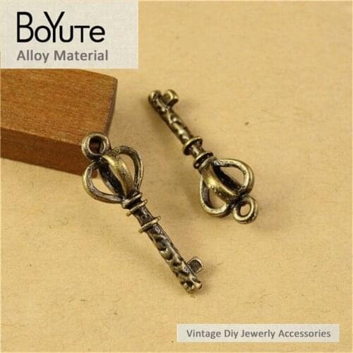 BoYuTe (100 Pieces/Lot) 23*8MM Vintage Key Accessories Parts Wholesale Antique Bronze Crown Pendant Materials for Jewelry Making