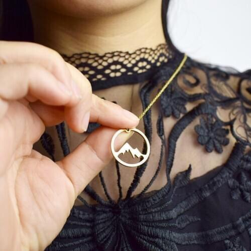 Europe and the United States hot titanium steel hollowed-out mountain necklace round mountain jewelry