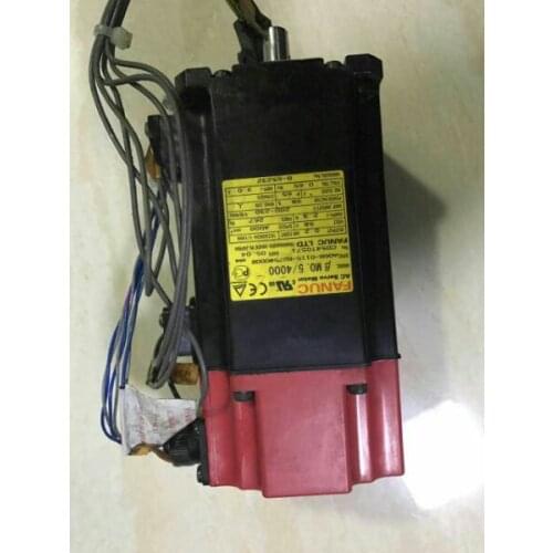 A06B-0115-B275 servo motor , used in good condition . 80% appearance new , good working , free shipping