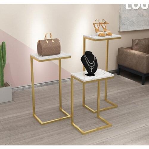 Clothing shop iron window display rack simple high and low running water in the creative imitation stone shoes jewelry floor boo