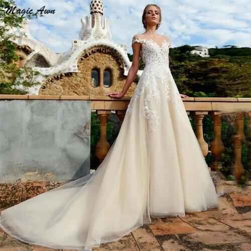 Magic Awn Elegant Champagne Boho Wedding Dresses Lace Appliques Illusion Backless A-Line Princess Wedding Party Dress Mariage